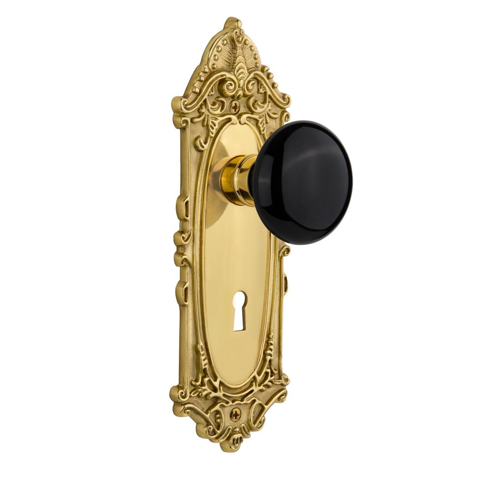 Nostalgic Warehouse VICBLK Mortise Victorian Plate with Black Porcelain Knob and Keyhole in Unlacquered Brass